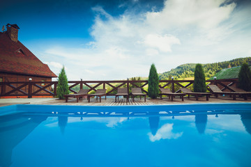 Fototapeta na wymiar Small pool for relaxing at a mountain resort