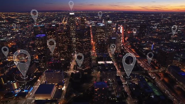 Aerial smart city. Localization icons in a connected futuristic city.   Technology concept, data communication, artificial intelligence, internet of things. Los Angeles skyline.