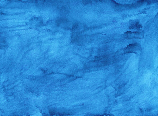Watercolor liquid blue background texture. Hand painted watercolour backdrop. Sky blue stains on paper.
