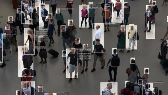 High view of commuters walking. Facial recognition interface showing personal data for each person. Surveillance concept. Artificial intelligence. Deep learning.