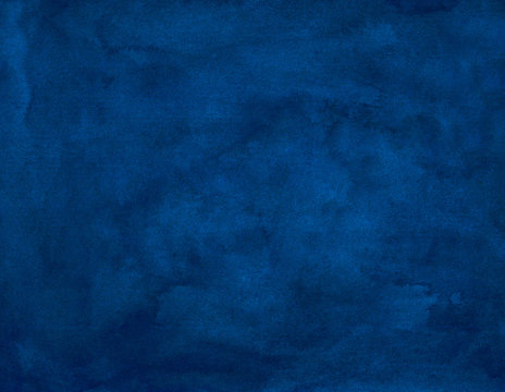 Watercolor old dark blue background painting. Vintage hand painted deep ocean blue watercolour backdrop. Stains on paper.