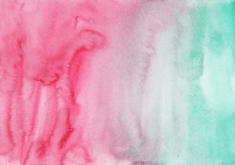 Watercolor pastel pink and green background painting texture. Abstract light gradient. Multicolored watercolour liquid backdrop. Stains on paper.