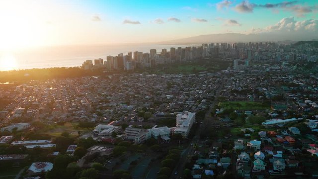 Aerial Honolulu skyline. Modern hotels, resorts and buildings. Residential neighborhood with huge homes. Oahu, Hawaii. Unites States.
