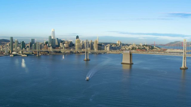  Aerial view of San Francisco financial district and the Bay Bridge. California, United States. Shot on Red weapon 8K.