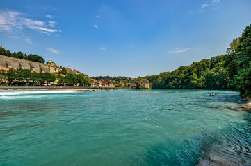 Bern, Switzerland - July 26, 2019: Panoramic view at sunny summer day. Aare river near Schwellenmatteli sport complex city Park