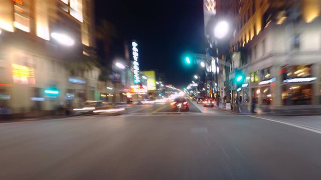 Hyperlapsed view from a car at night. POV. Hollywood, Los Angeles, United States. Perfect to represent concepts as autonomous driving, futuristic cityscape, city life, etc.  