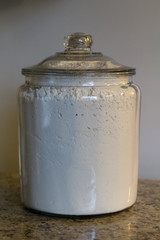 Glass flour jar completely full