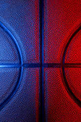 Closeup detail of basketball ball texture background. Blue neon Banner Art concept © Augustas Cetkauskas