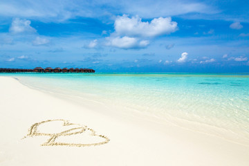 Sea and blue sky. Blue sea water and  sky with white fluffy clouds. Horizontal background of blue sea. Tropical landscape