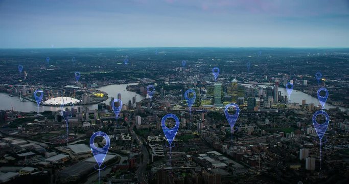 Aerial smart city. Localization icons in a connected futuristic city.  Technology concept, data communication, artificial intelligence, internet of things. London skyline.