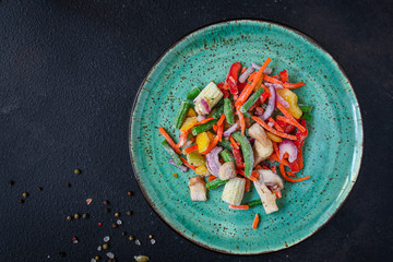 frozen vegetables mix salad (onions, corn, peppers, paprika, mushrooms, asparagus beans, carrots and others, ketogenic diet) menu concept. food background. top view. copy space