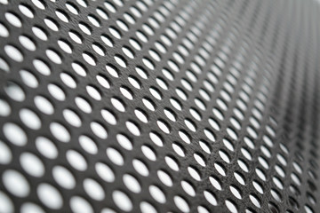 Texture of perforated metal sheet abstract background. Detailed texture background gray sheet metal perforated.