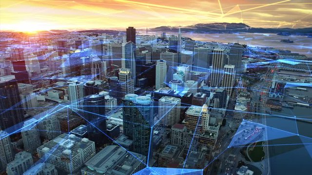  Aerial view of the financial district and the Oakland Bay Bridge of San Francisco with futuristic connections. California. United States. Skyline. Shot from helicopter. Technology.