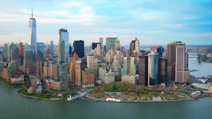 Aerial view of the Financial District in Lower Manhattan. Famous Skyscrapers. Daytime New York City, United States. Shot from a helicopter.