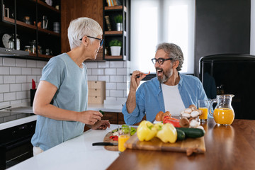 Old couple having breakfast