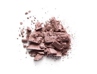 Broken eye shadow blush bronzer isolated on white background. Pink crushed makeup powder texture. Nude color cosmetic product swatch