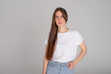 Obraz premium young woman confused on white