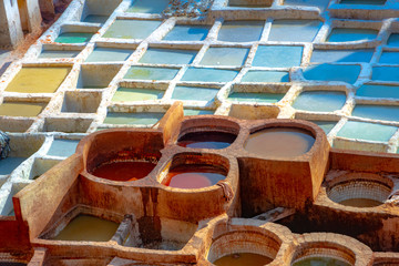 Leather dying in a traditional tannery in the city Fes, Morocco