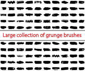 Collection of brushes in grunge style. Horizontal strokes of black paint on a white background. Abstract ink spots