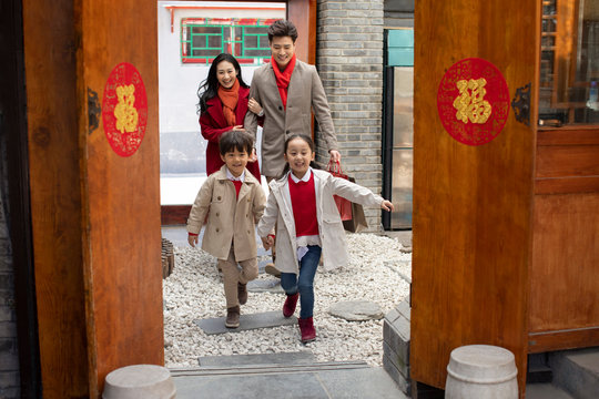 Happy young family celebrating Chinese New Year