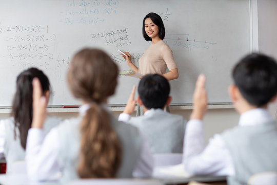 Young teacher teaching a class