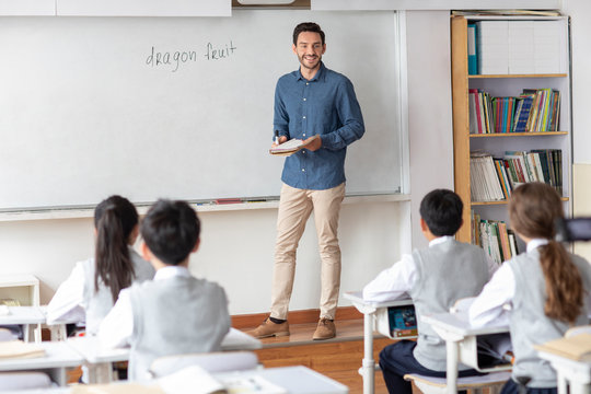 Young teacher teaching a class