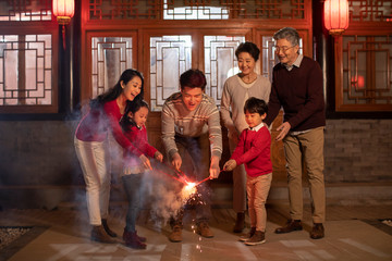Happy family celebrating Chinese New Year