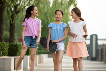 Teenager girls having fun outdoors
