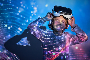 Child wearing virtual glasses at home with colored light effects