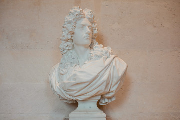 Historic bust sculpture of man in museum of Paris, France