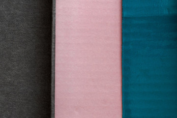 Fototapeta premium pink, blue and dark gray background showing different textures made with cartons
