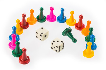Colorful game pieces and dice