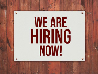 hiring now sign on texture background