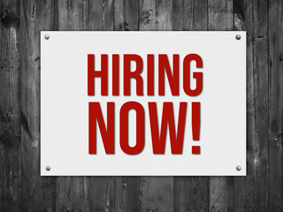 hiring now sign on texture background