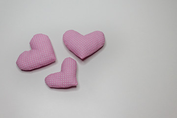Heart made of pink beaded pea.