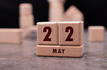 May 22 written with wooden blocks