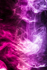 Colored smoke on black background