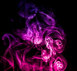 Colored smoke on black background