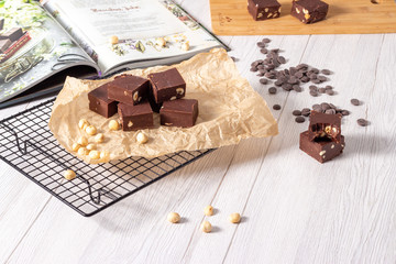 Delicious fudge with homemade chocolate and nuts