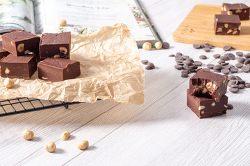 Delicious fudge with homemade chocolate and nuts