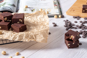 Delicious fudge with homemade chocolate and nuts