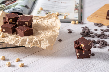 Delicious fudge with homemade chocolate and nuts