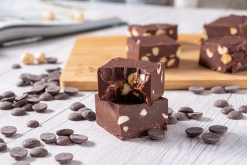 Delicious fudge with homemade chocolate and nuts