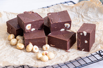 Delicious fudge with homemade chocolate and nuts
