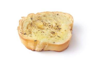 sliced homemade toasted herb bread isolated white background