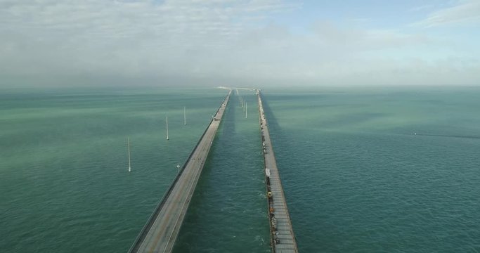 Aerial View of Seven Mile Bridge in The Florida Keys on a Beautiful Day With Beautiful Turquoise Water Tracking Forward