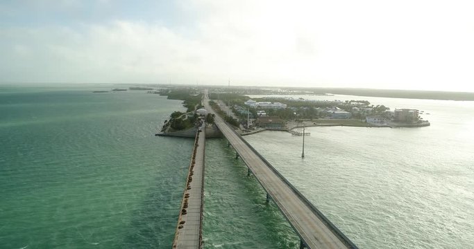 Aerial View of Seven Mile Bridge in The Florida Keys on a Beautiful Day With Beautiful Turquoise Water Tracking Right