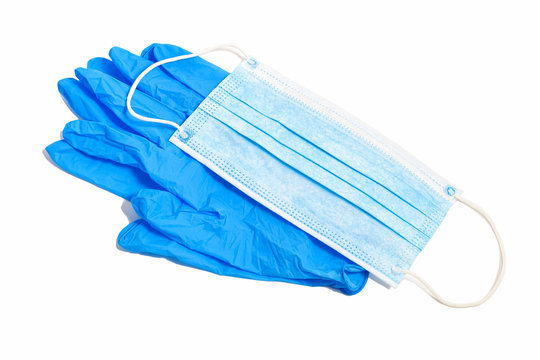 A Pair Of Thin Blue Medical Latex Gloves And Face Shield On A White Background. Disposable Rubber Medical Gloves And Mask. Protective Subjects. Remedies.