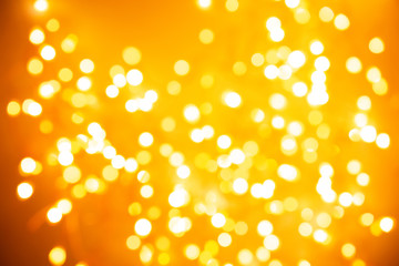Bright warm bokeh lights. Holiday, Party, Christmas and New Year background. Ideal to layer with any design. Horizontal