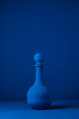 blue carafe on a blue background, blue poster, trend color, vertical image
